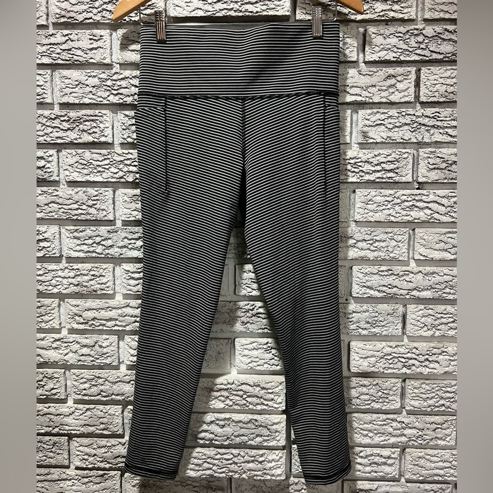 Athleta Salutation Stash Pocket Black and White Striped Leggings